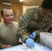 Medics run tests during a training exercise