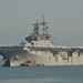 Family and friends look on as the amphibious assault ship USS Kearsarge returns to Naval Station Norfolk