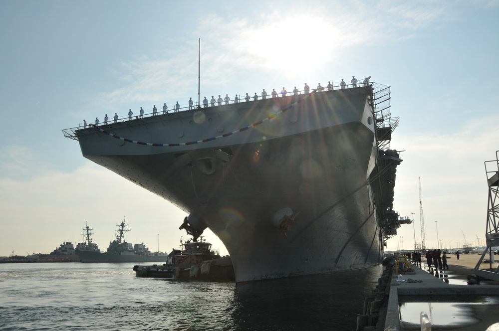 The amphibious assault ship USS Kearsarge returns to Naval Station Norfolk