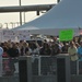 Family and friends look on as the amphibious assault ship USS Kearsarge returns to Naval Station Norfolk
