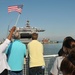 Family and friends look on as the amphibious assault ship USS Kearsarge returns to Naval Station Norfolk