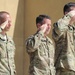 Command teams from CFSOCC-A salute during the National Anthem