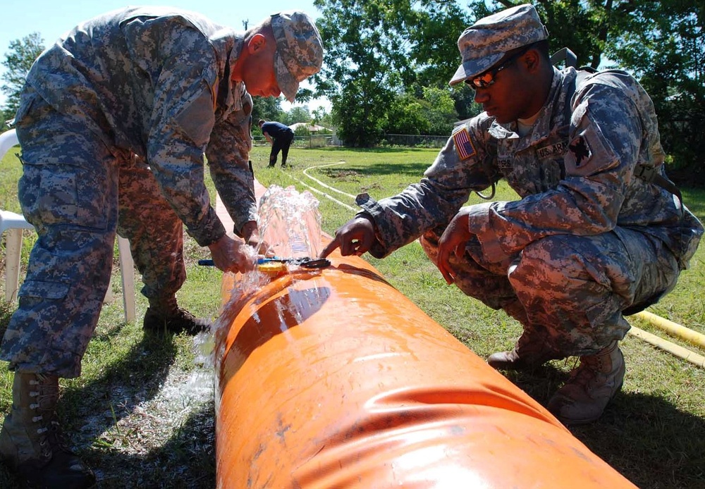 Tiger Brigade guardsmen lay Tiger Dam in Terrebonne