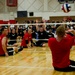 Marines compete in sitting volleyball during Warrior Games