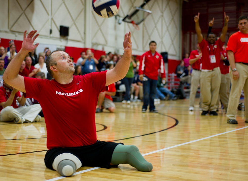 Marines compete in sitting volleyball at Warrior Games