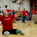Marines compete in sitting volleyball at Warrior Games