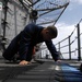USS Gettysburg sailors prepare for a gun exercise.