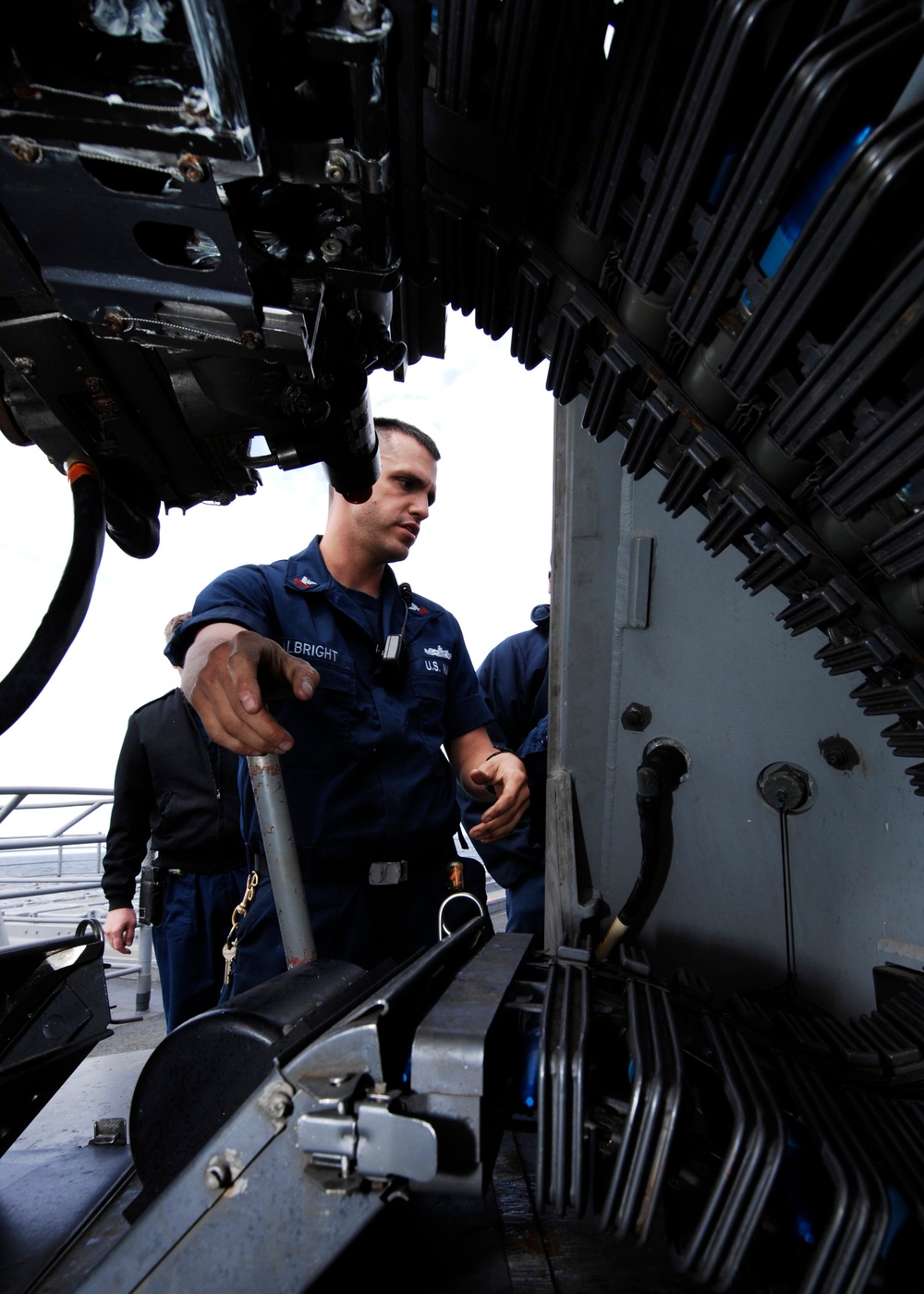 USS Gettysburg sailors prepare for a gun exercise.
