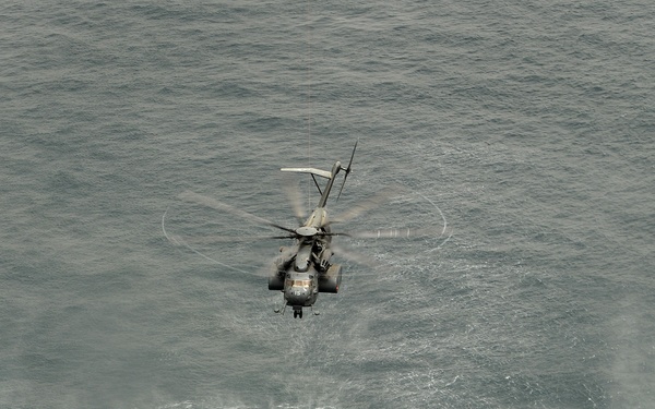 Navy helicopter deploys mine countermeasures in training