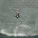 Navy helicopter deploys mine countermeasures in training