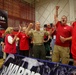 Commandant and sergeant major cheer All-Marine sitting volleyball team