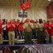 Commandant and sergeant major cheer All-Marine sitting volleyball team