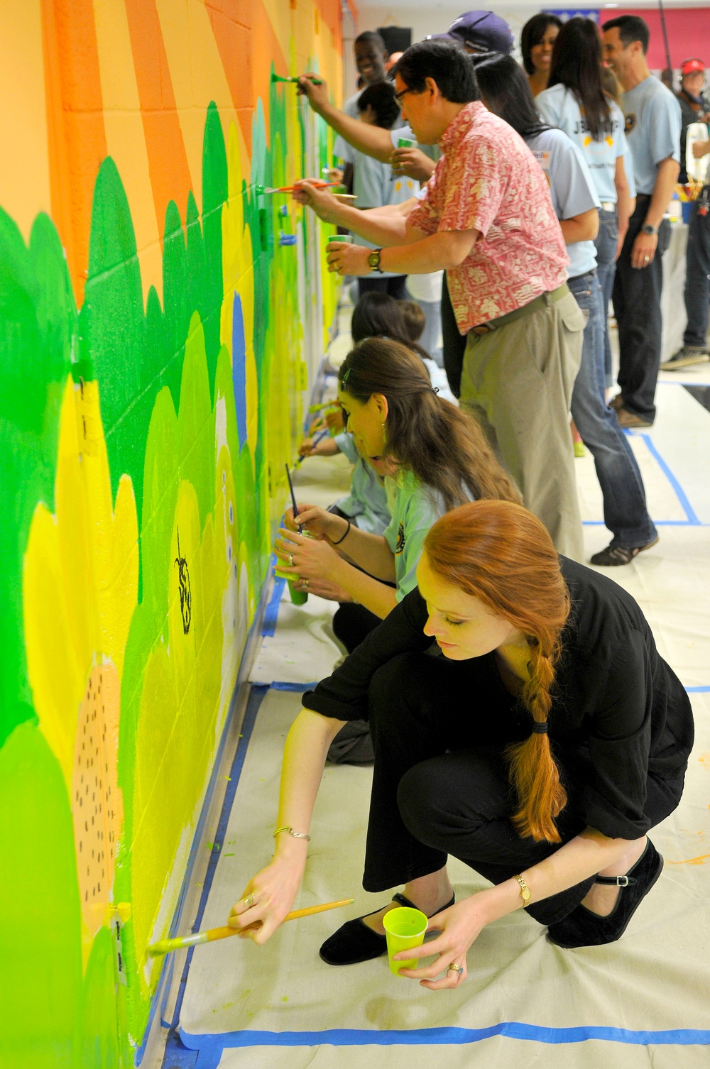 First Lady of the US, Congressional Spouses, youth paint mural at Joint Base Anacostia-Bolling