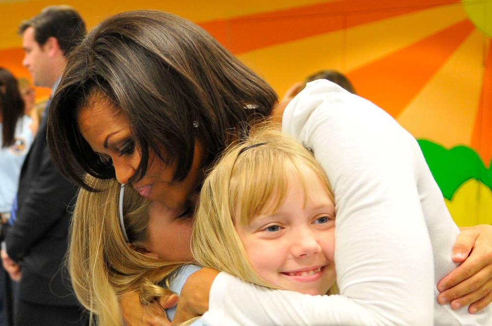 First Lady of the US, Congressional Spouses, youth paint mural at Joint Base Anacostia-Bolling