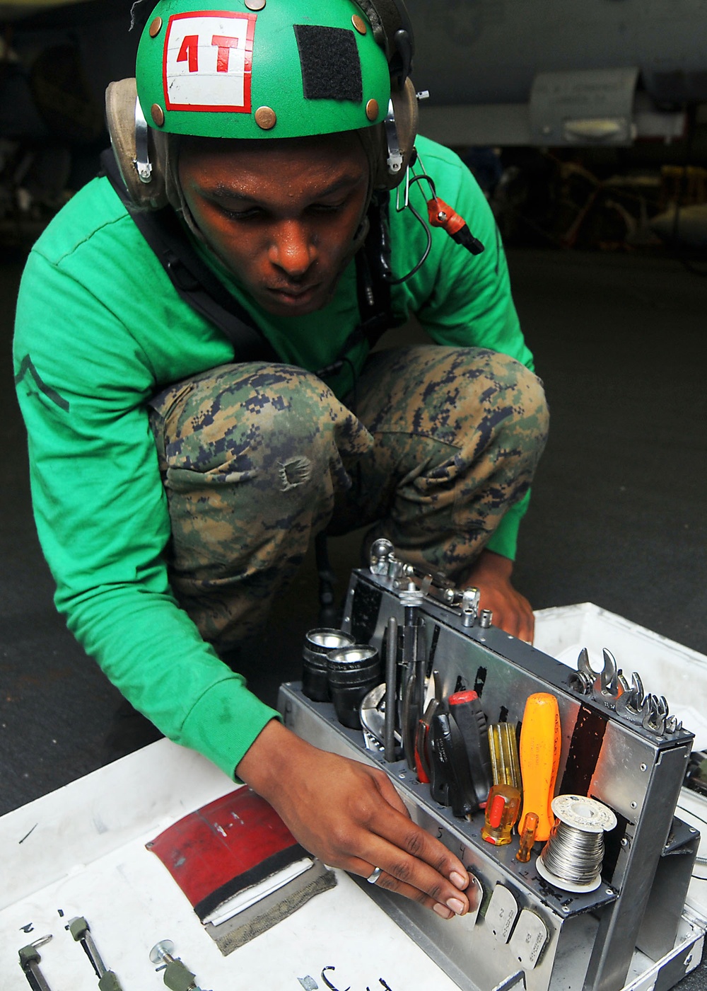 USS Ronald Reagan sailor conducts toolbox inspection