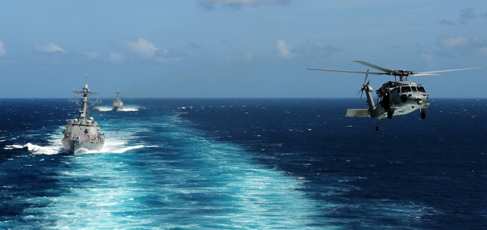 USS Kidd and USS Pinckney transits the Pacific Ocean