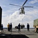 USS Whidbey Island sailors await supply drop