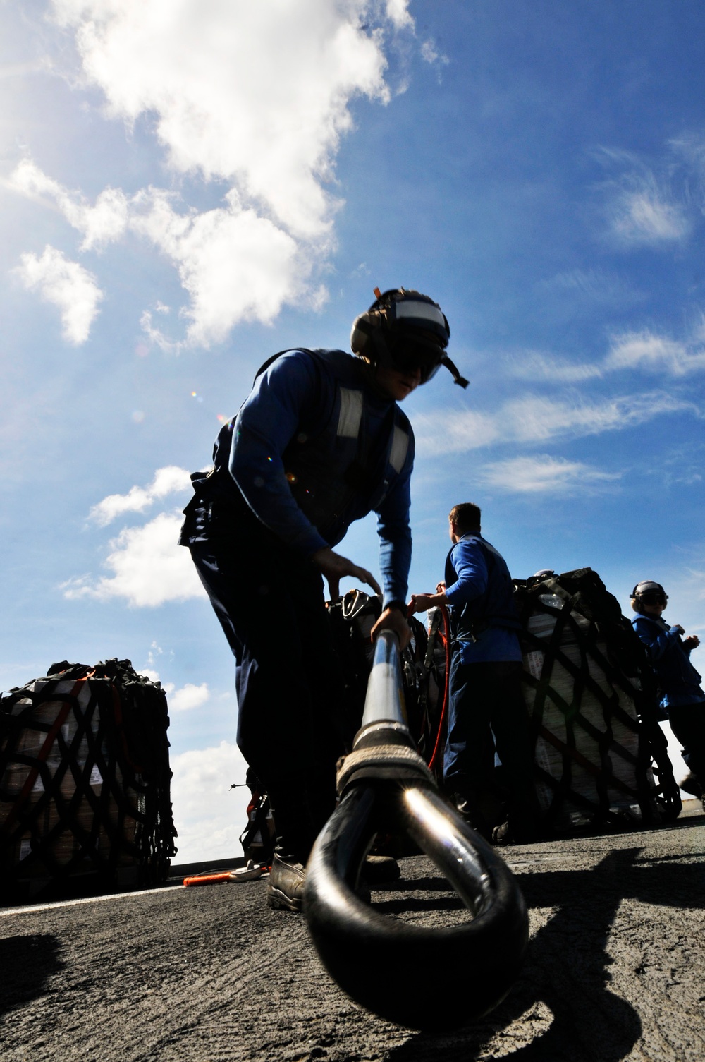 USS Whidbey Island sailors await supply drop