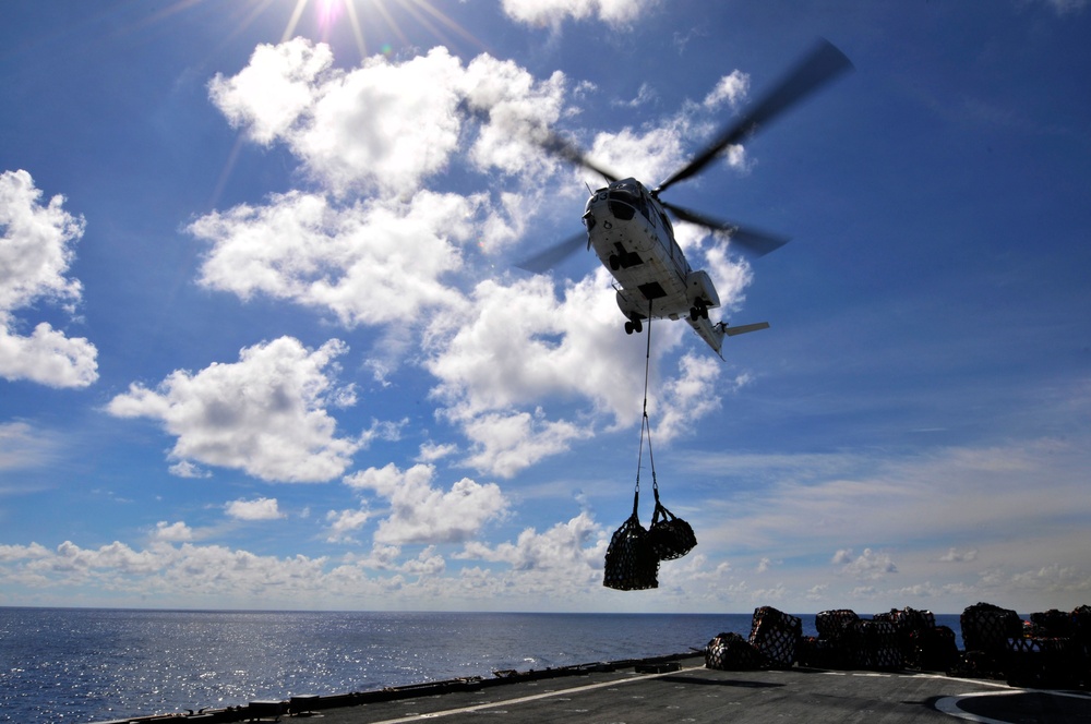 USS Whidbey Island sailors await supply drop