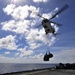 USS Whidbey Island sailors await supply drop