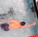 Navy/Coast Guard swimmer competes during prelims