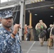 Service members unload equipment in port operation