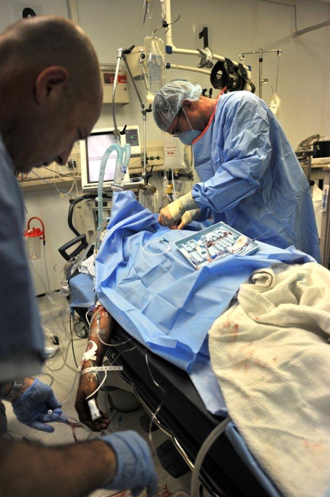 Bagram medics face wars' worst, fight for survivors