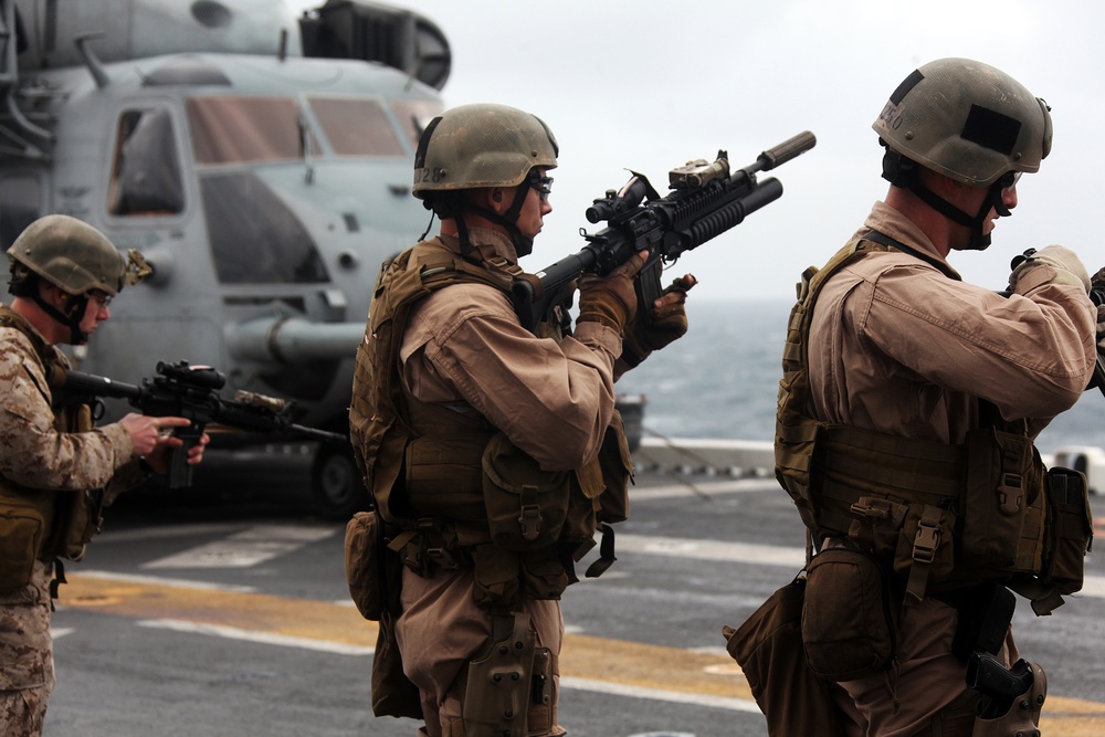 Recon Marines Fire Weapons Aboard USS Bataan