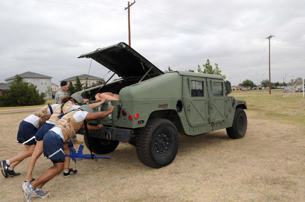 97th SFS holds a team obstacle course for Police Week