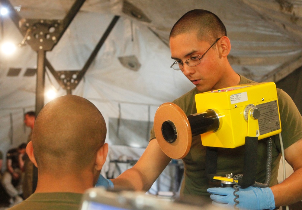 Sailors set up field dental station