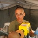Sailors set up field dental station