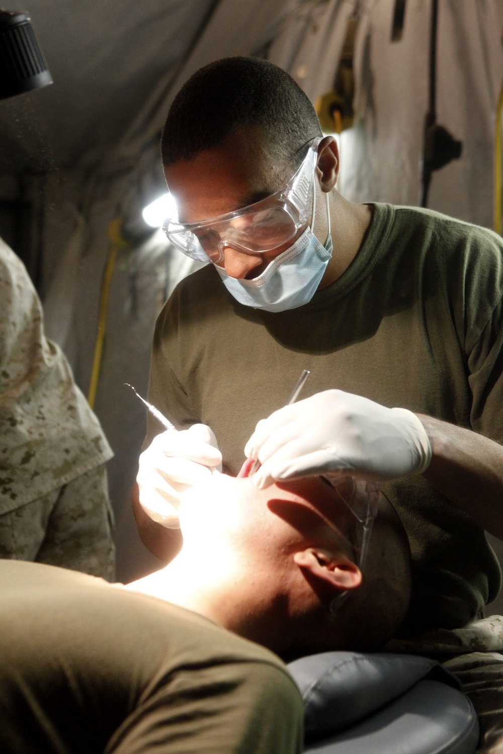 Sailors set up field dental station