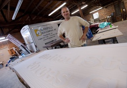 Fayetteville sign maker leaving his mark on new headquarters