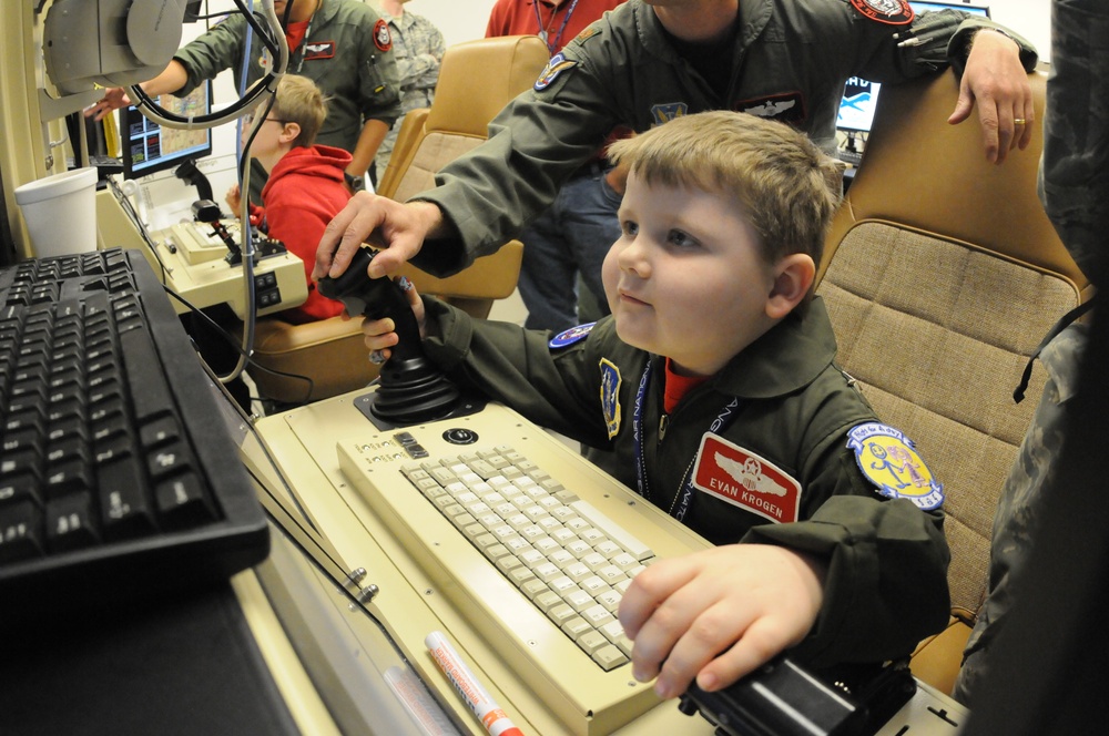 Young boy is pilot for the day at 119th Wing