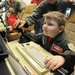 Young boy is pilot for the day at 119th Wing