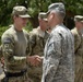 Sgt. Maj. Chandler shakes soldier's hand