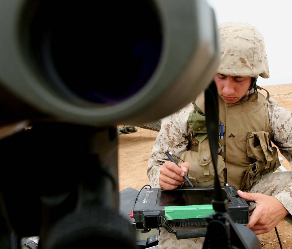 Forward observers guide artillery fire on target during African Lion 2011