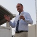 British Consul Gen. Richard Wood addresses an audience at a British Compound