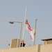 The British Naval Ensign flag is lowers at the British Compound on Contingency Operating Base Basra