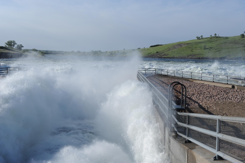 Water surges from Oahe Dam