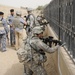 ‘First Lightning’ Battalion artillerymen patrol with 1st Iraqi Federal Police Division