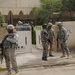 ‘First Lightning’ Battalion artillerymen patrol with 1st Iraqi Federal Police Division