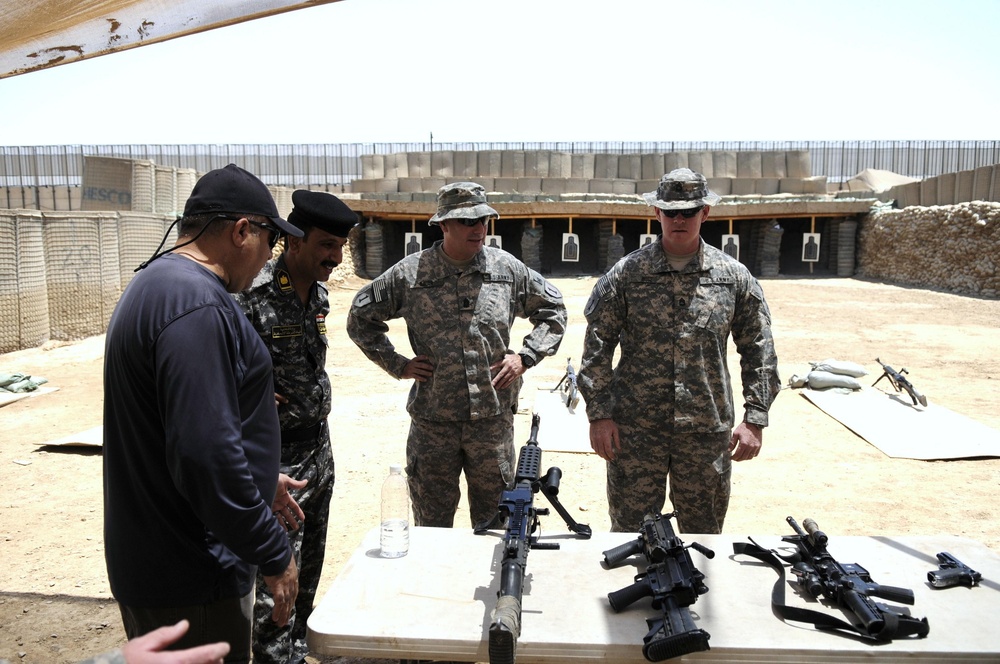 ‘First Lightning’ Battalion artillerymen showcase weapons and knowledge to Iraqi 1st Federal Police Division