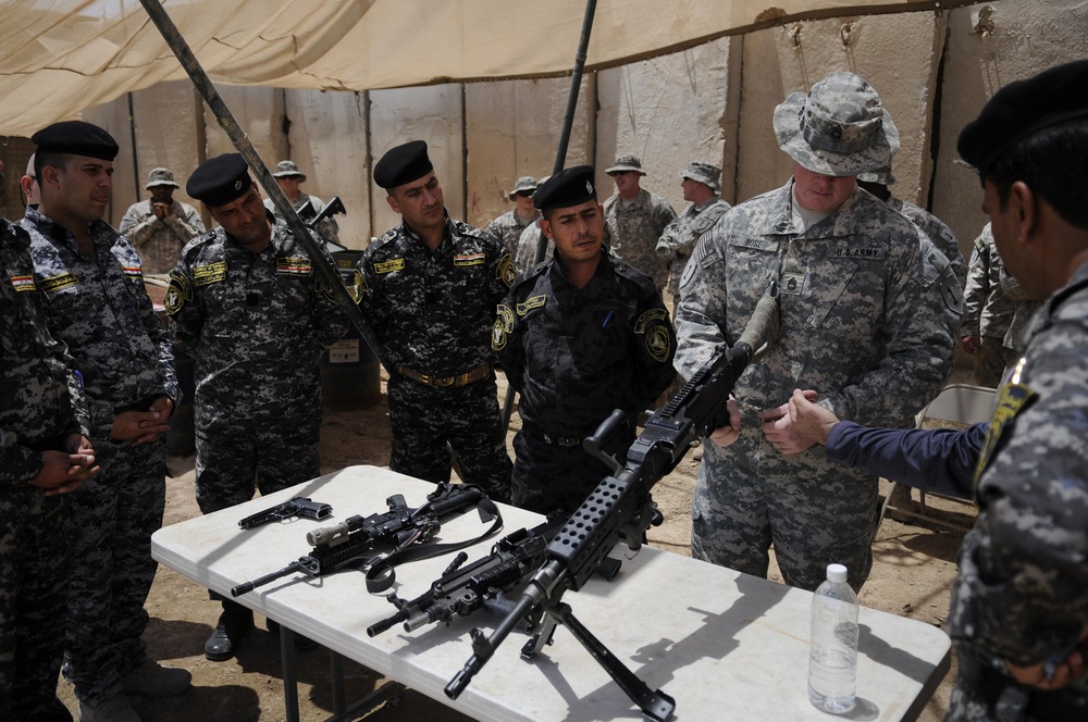 'First Lightning’ Battalion artillerymen showcase weapons and knowledge to Iraqi 1st Federal Police Division
