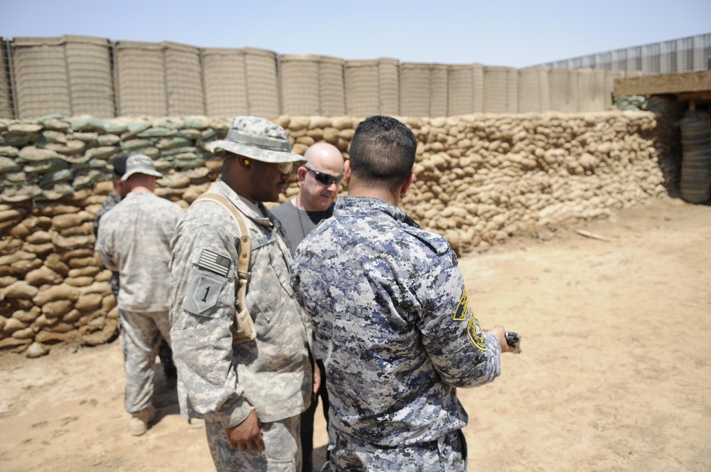 'First Lightning’ Battalion artillerymen showcase weapons and knowledge to Iraqi 1st Federal Police Division