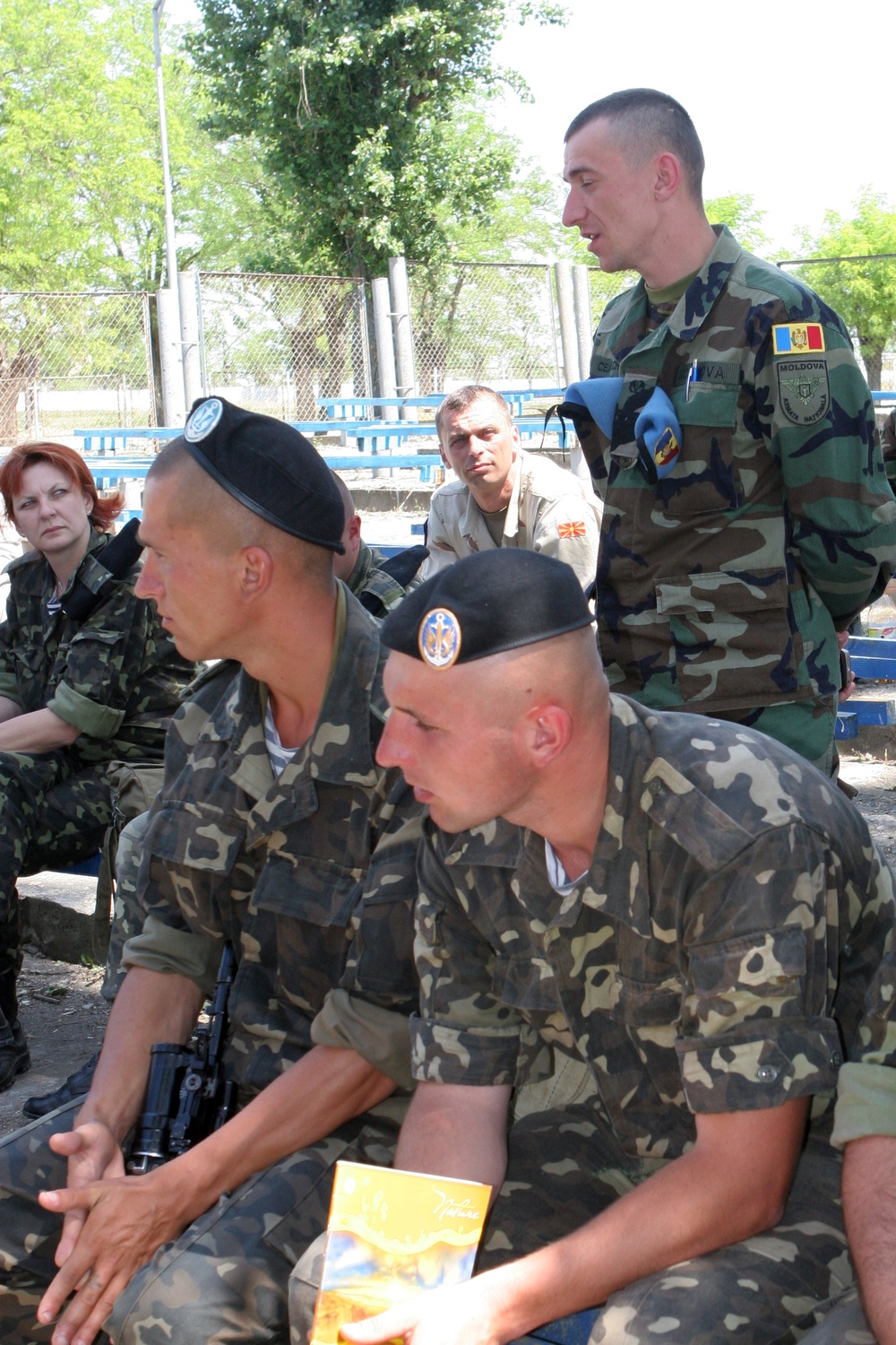 Participants ask questions during NCO development course