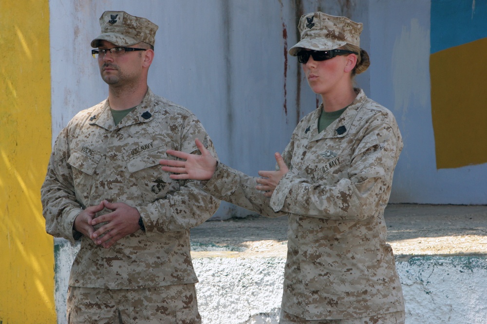 US Navy corpsman speak to attendees of NCO development course