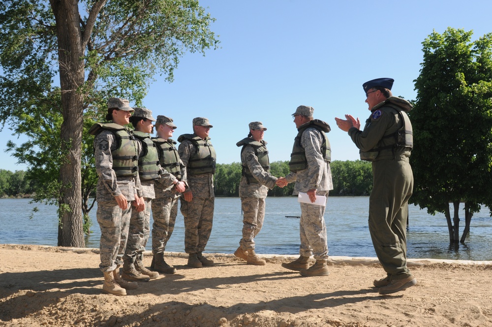 Five National Guard airmen reenlist on levee