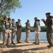 Five National Guard airmen reenlist on levee