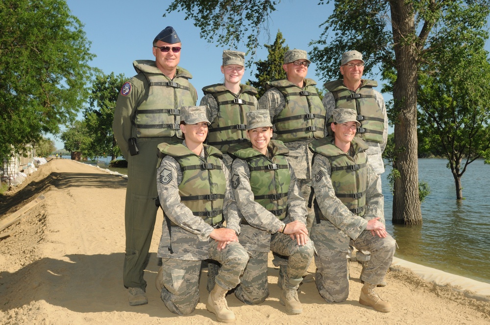 Five National Guard airmen reenlist on levee
